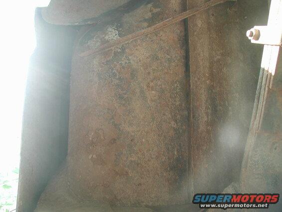 Right side, looking straight up and back a little (leaf spring to the right).