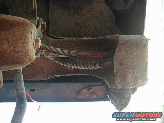 Left side, looking straight up (shackle to the left).