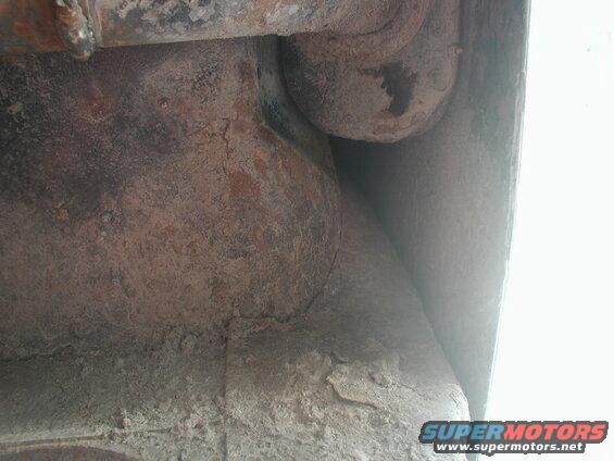 Left side, looking straight up (shackle to the left).
