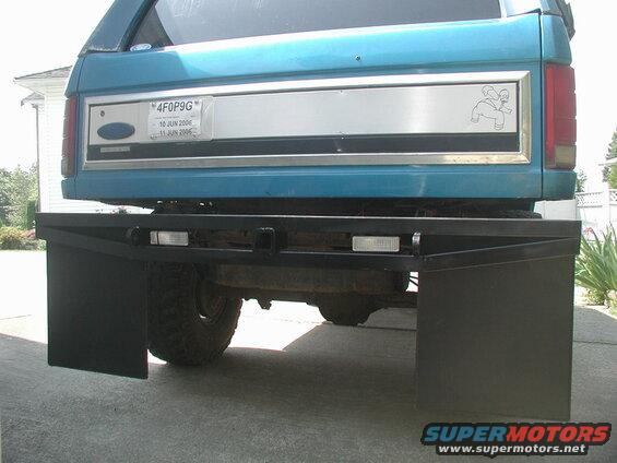 I also welded in a receiver tube, and mounted the back-up lights between the tubes.