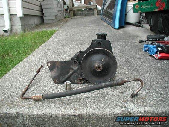 Saginaw pump, stock bracket from my Bronco, 1.25" spacer, and van pressure hose.