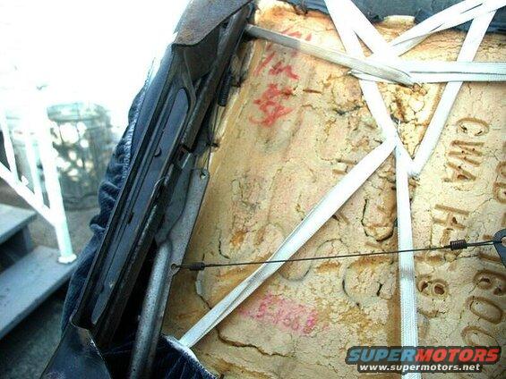 Close up of drivers seat - left side linkage.