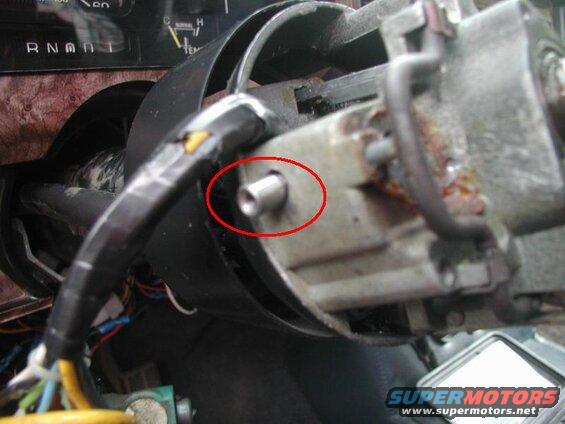 Remove the two pivot pins.