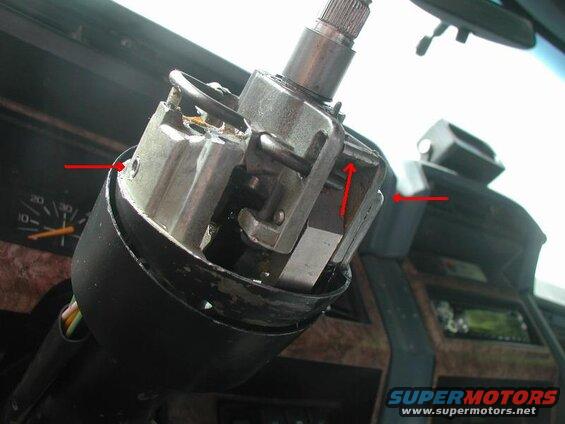 Lower the tilt jaw to clear the lock pin, line up the tilt flange and tap in the pivot pins.