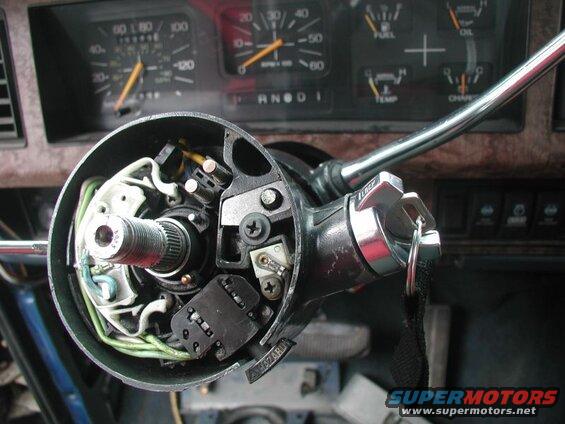 Slide the cylinder in and turn it to "off" to lock it into place.