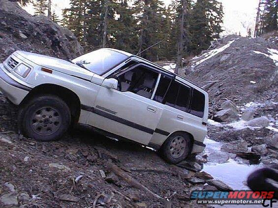We continue on our way. Chris F gets hung up with no where to go. I opted to use the new winch for the first time to pull him out.