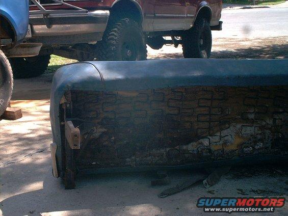 Passenger side under the seat.