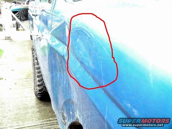 Tree ding on the right front fender.
