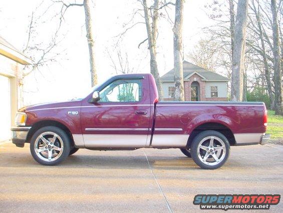 1997 Ford F-150 side view, maroon and tan