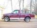 1997 Ford F-150 - This 1997 Ford F-150 is shown in a side profile, a two-tone maroon and tan paint scheme.