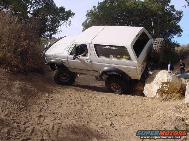 carrier1.jpeg First setup had a spare tire carrier mounted on the bumper.. It worked well but with the 38x15.5 tire slamming down on stuff took its toll on it.