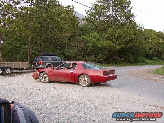 These four guys were getting ready to put the beat-down on this poor old Firebird. The driver came walking back a few minutes later as the battery had died.