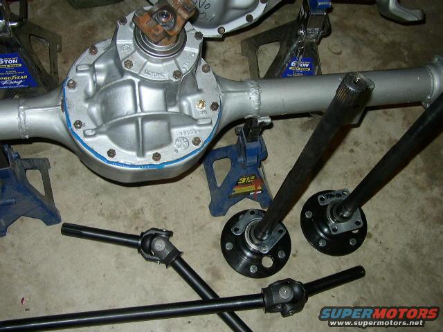 rear axle assembly and driveshafts on jack stands
