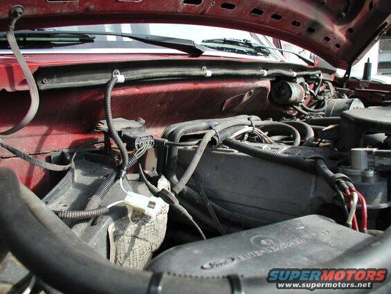The previous owner tapped into the wiper motor harness for an ignition source for the brake controller; I removed the controller and re-used the connector for my voltmeter.