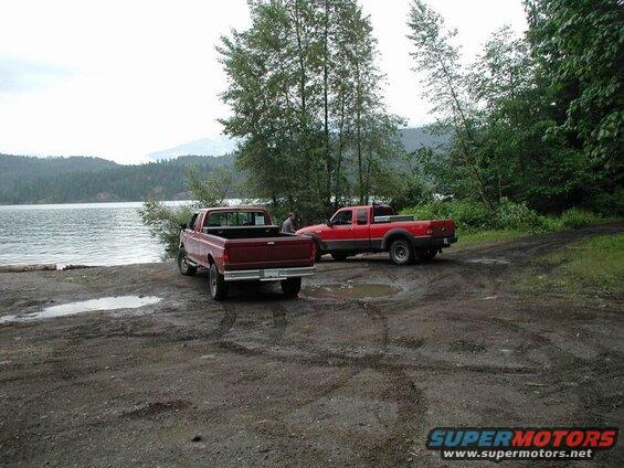 Two red Ford's taking a quick break.