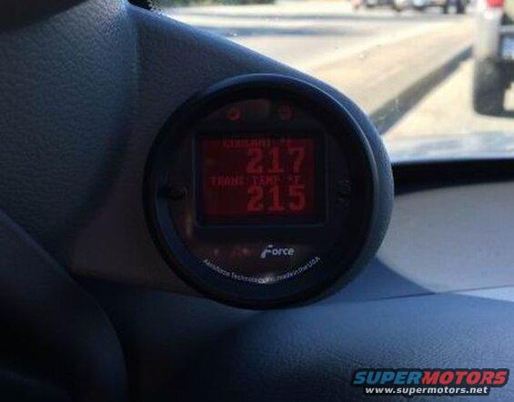 Digital gauge showing engine coolant temp 217 and transmission temp 215.