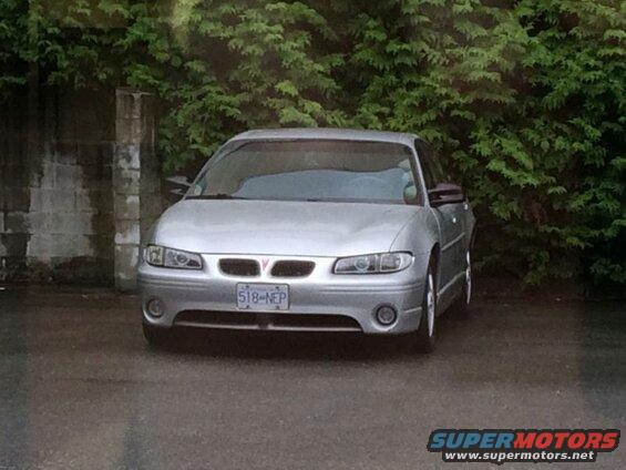 Silver 2002 Pontiac Grand Prix front view with license plate 518-NEP