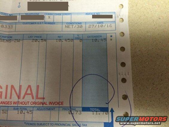 Close-up of a receipt with financial details and text.