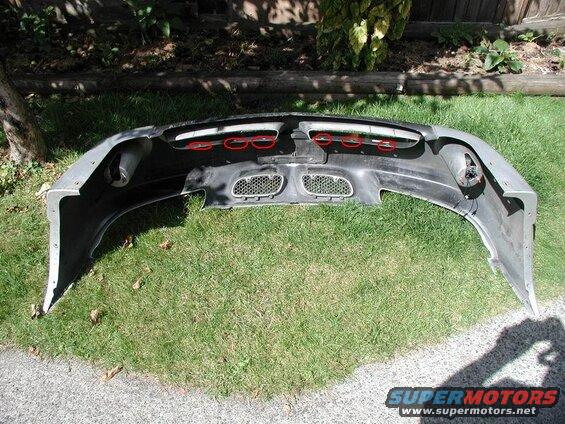 Six plastic rivets on the lower part of the bumper.