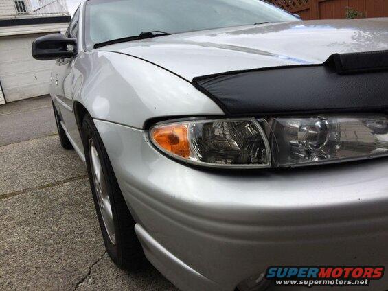 Aftermarket headlight housings, stock brackets and aftermarket clear corners. Sag same as clear corners.