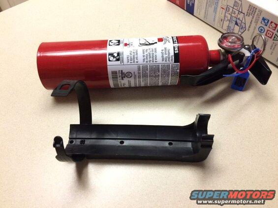 Red fire extinguisher and black mounting bracket
