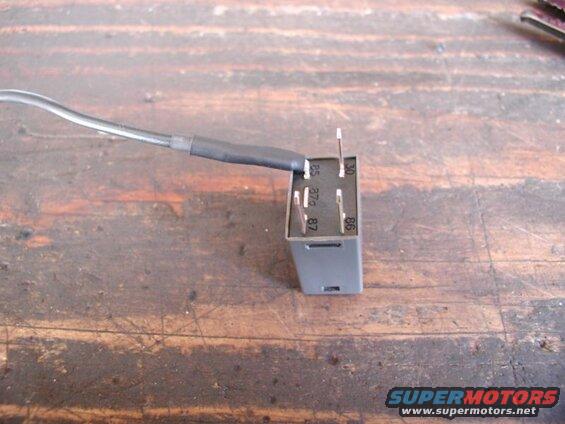 Remove relay #17 from the underhood fuse panel. Bend terminal #85 and attach a piece of wire to it.