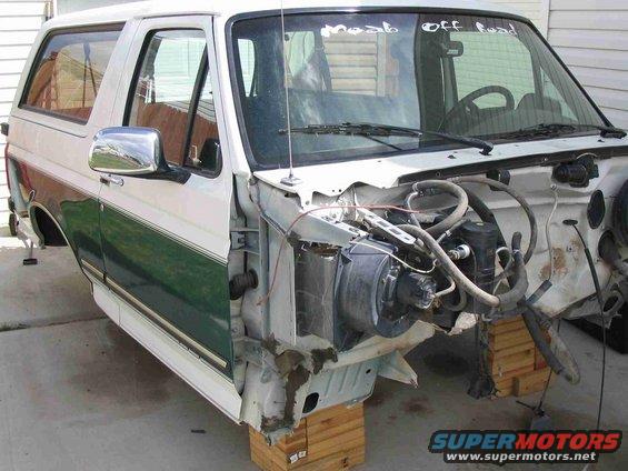 1996 Ford Bronco, front end disassembled, showing engine bay components and side body panels