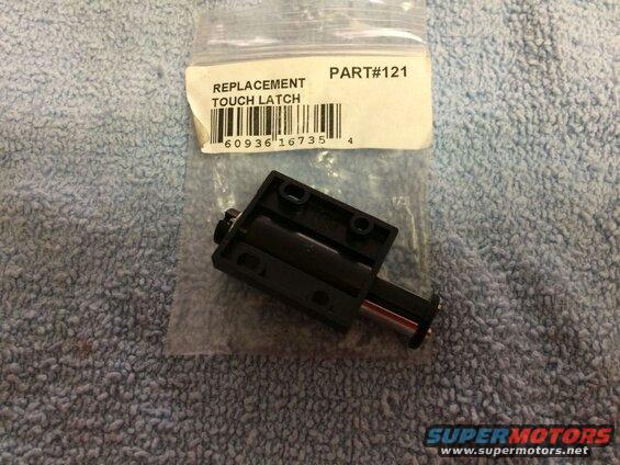 Black touch latch part in packaging with label