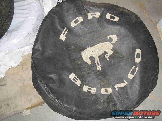 Spare tire cover with Ford Bronco logo and text