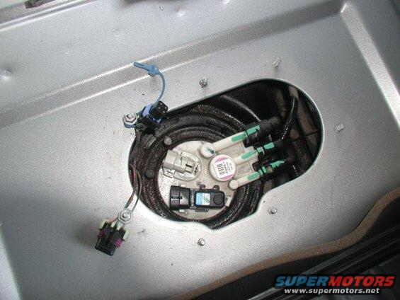 Disconnect the two plugs.