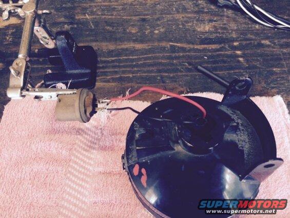 Connect the base of an old 880 bulb to the wires of the LED light.