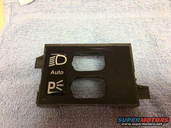 Black vinyl applied. You can see some imperfections at certain angles, but once in the vehicle, they won't be seen.
