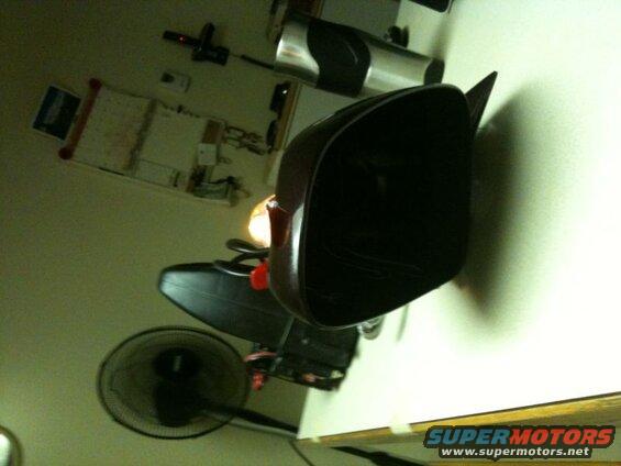 Testing the turn light on a spare mirror.