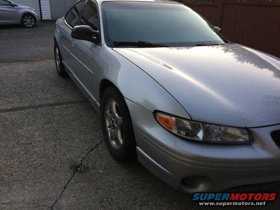 Silver 2002 Pontiac Grand Prix passenger side front view