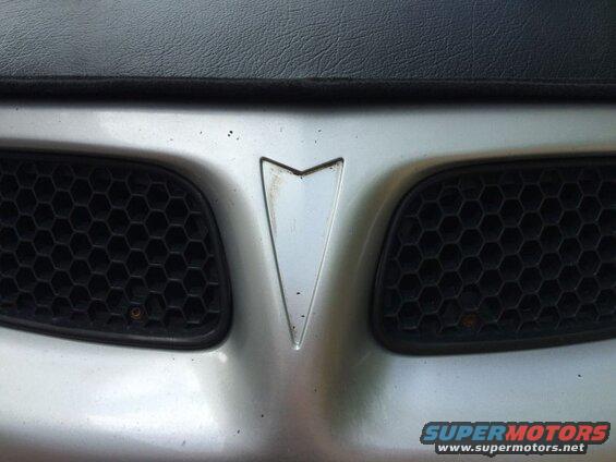 Clean the area where the emblem was.
