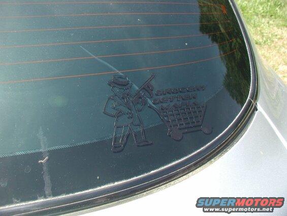 Decided to place it in the lower right corner of the back window.