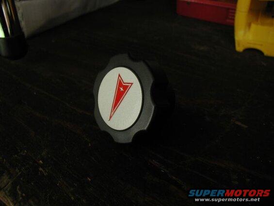 After cleaning the top surface of the cap with brake clean, I scuffed the decal area with a red scotchbrite, wiped down with brake-clean, then applied the overlay decal.