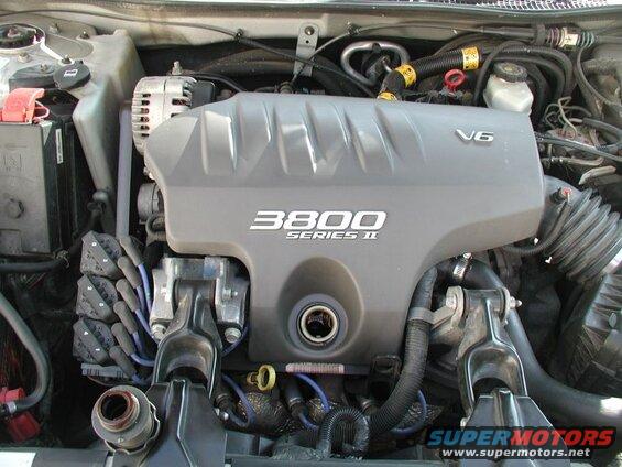 Remove the oil cap and extension.