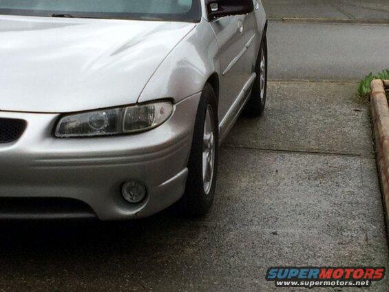 Silver 2002 Pontiac Grand Prix front passenger side view