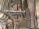 1991 Ford Crown Victoria - A detailed view of various engine components, including hoses and exhaust parts, within a vehicle.
