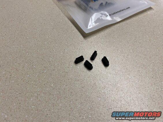 Rubber plugs for the USB-c ports.