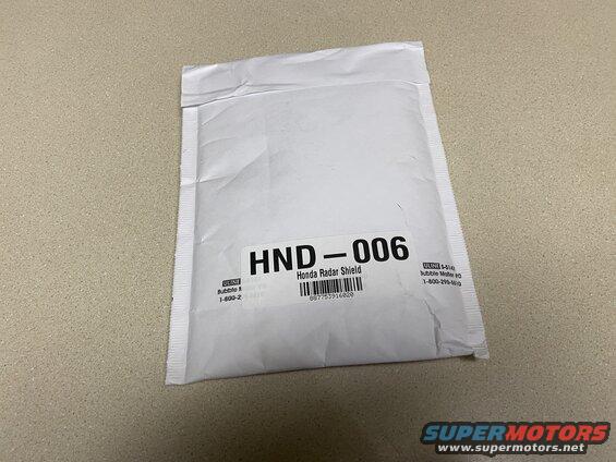 White padded envelope with shipping label for Honda Radar Shield.