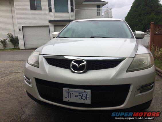 Silver 2009 Mazda CX-9 front view with license plate JD1 55H