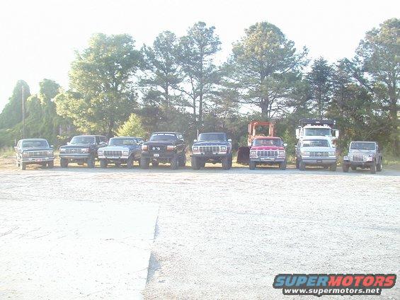 p1010030.jpg The trucks are as follows from left to right.  Dennis (Ga Dawg), Me (SMOOTH), Mel (Bronco Babe), Shane (Blaze), Dale (79F150), Damon (2Fordtrucks), Spencer (Spence007), and Kelsey (Bockwho).