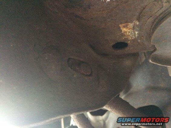 Left rear; lateral arm to subframe. Appears to have been this way for quite some time, and the pre-purchase inspection missed it.
