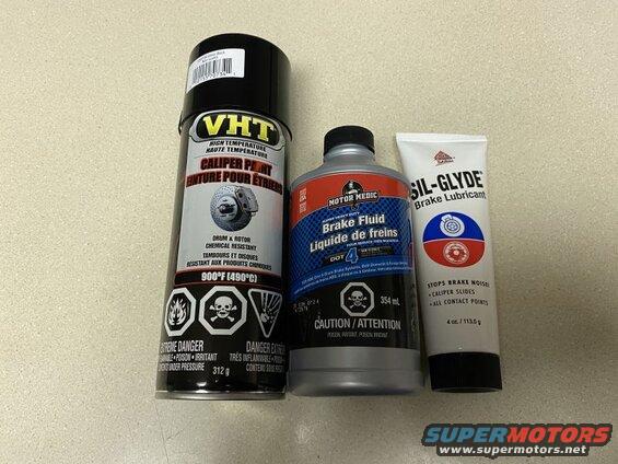 Can of VHT caliper paint, bottle of Motor Medic brake fluid, and Sil-Glyde brake lubricant.