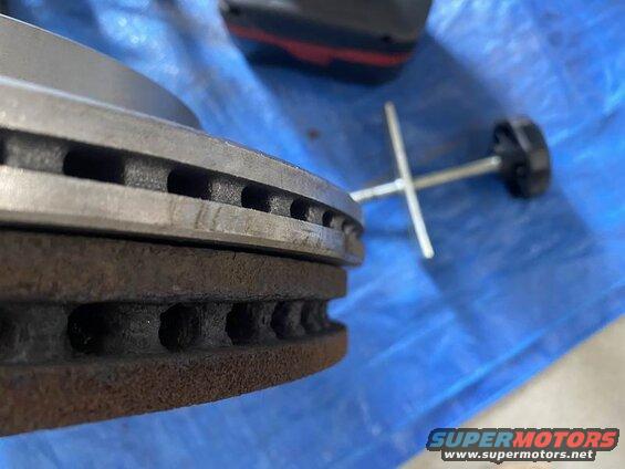 Rear rotor vs front rotor; the rear is slightly larger diameter.