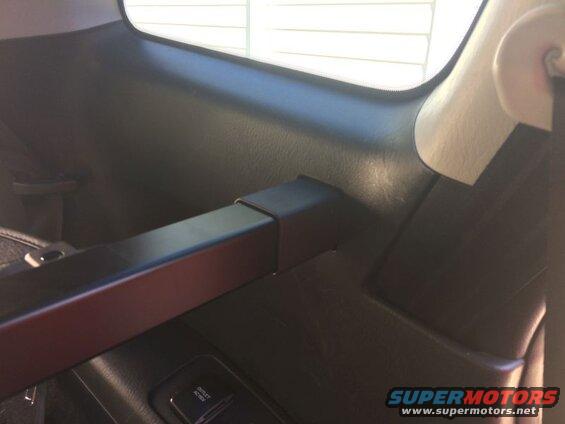 Insert ends of cargo cover.