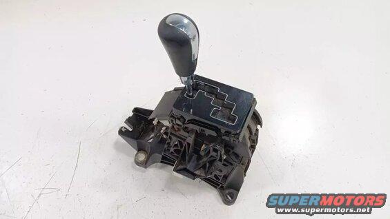 Black automatic transmission shifter assembly with chrome and black knob.