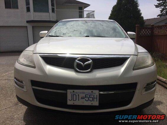 White 2009 Mazda CX-9 front view with British Columbia license plate JD1 55H